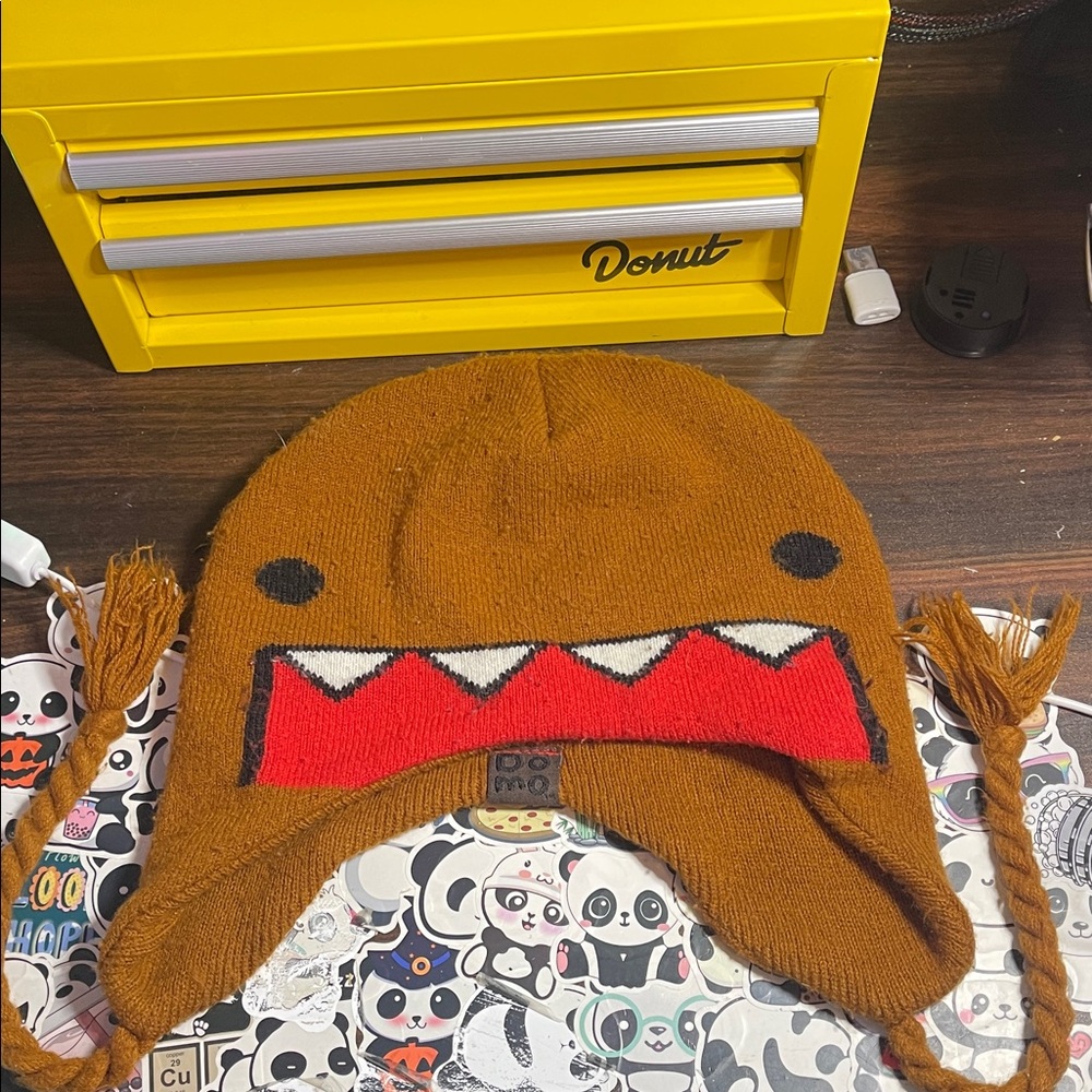 Domo 2010 Brown Knit Hat with Red and White Design